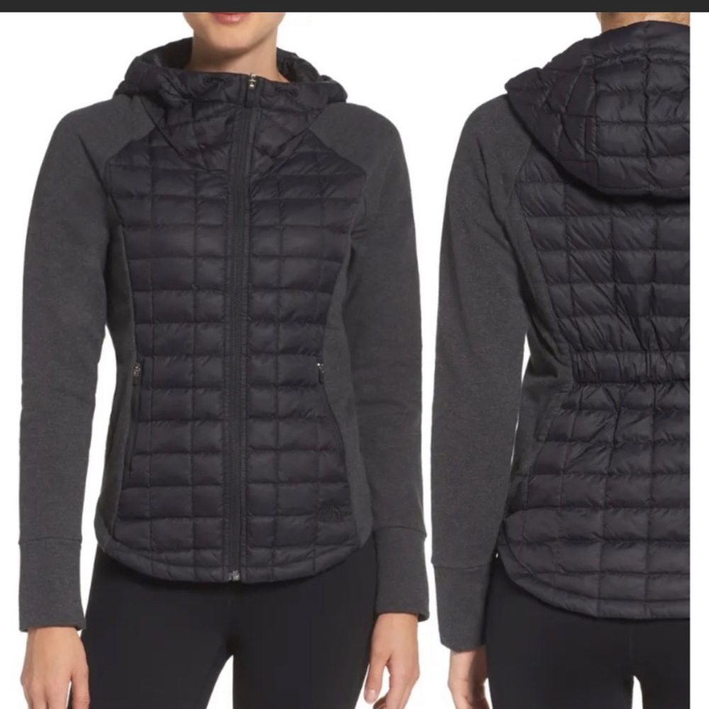 black/grey woman’s north face jacket